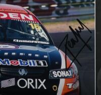 KELLY: A colour image of Rick and Todd Kelly racing the HSV dealer Team VZ Commodore at Mount Panorama, Bathurst, 2006. Rick & Todd Kelly signatures - 2