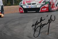 SKAIFE/KELLY: A colour image of Mark Skaife and Todd Kelly racing the Holden Racing Team VY Commodores at Oran Park Raceway, 2004. Image signed by Todd Kelly & Mark Skaife - 2