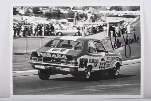 BROCK: A black and white image of Peter Brock racing the Holden LJ XU-1 Torana. Peter Brock signature