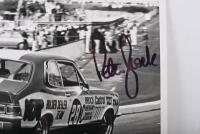 BROCK: A black and white image of Peter Brock racing the Holden LJ XU-1 Torana. Peter Brock signature - 2
