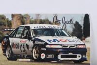 BROCK: A colour image on photographic paper of the HRT Racing VR Holden Commodore of Peter Brock. Peter Brock signature - 2