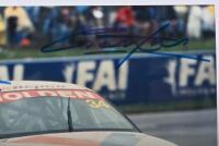 BATHURST 2000: A colour image on photographic paper of the Bathurst 2000 winning Garry Rogers Motorsport VT Holden Commodore of Jason Bargwanna and Garth Tander. Bargwanna & Tander signatures - 3