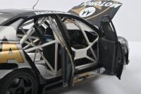TEAM BROCK: A AUTOART HOLDEN COMMODORE VX TEAM BROCK 2002. Numbered '0587'/8000. Model commemorates 30 years since Peter Brock's first of nine wins and his last drive at "THE MOUNTAIN" on OCTOBER 13th 2002 - 4