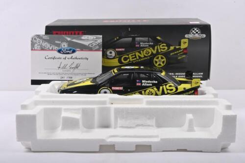 MOFFAT: A BIANTE 1:18 scale model of the 'ALLAN MOFFAT ENTERPRISES 1994 TOOHEYS 1000 FORD FALCON EB' as driven by Andrew Miedecke/Jeff Allam. Numbered '241'/700. CoA signed by Allan Moffat