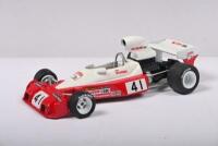 SCHENKEN: A 1:43 scale white metal model of a 1974 Trojan T103 as raced by Tim Schenken. Signed to base by Tim Schenken - 2