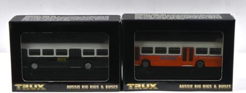 LEYLAND: Two 1:76 scale TRUX 'AUSSIE BIG RIGS & BUSES' 1972 Leyland National bus models. TX11 in orange/white 'Surfside', Gold Coast to Tweed Heads livery & TX11E in dark green/white 'MTT', Perth livery