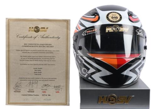 HSV: A Limited Edition racing helmet commemorating HSV's 20 years of V8 racing participation. Helmet signed by 2007 Team drivers - Garth Tander, Rick Kelly, Mark Skaife, Todd Kelly