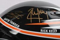 HSV: A Limited Edition racing helmet commemorating HSV's 20 years of V8 racing participation. Helmet signed by 2007 Team drivers - Garth Tander, Rick Kelly, Mark Skaife, Todd Kelly - 4