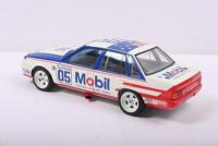 COMMODORE: A Limited Edition 1:18 scale Classic Carlectables Holden VK Commodore as raced by Peter Brock/David Oxton in 1985 Bathurst. 'Mobil' livery. Numbered '3841' - 3