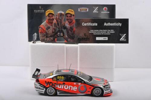 LOWNDES/SKAIFE: A Limited Edition CLASSIC CARLECTABLES 1:18 scale Craig Lowndes & Mark Skaife Year 2010 SUPERCHEAP AUTO BATHURST 1000 WINNER TeamVodafone VE Commodore. Numbered '4899'/5000. With 'PETER BROCK TROPHY WINNER' scale replica trophy