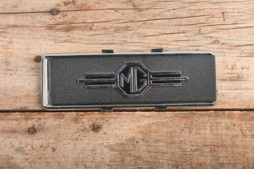 MG: An original MG B dash radio cover