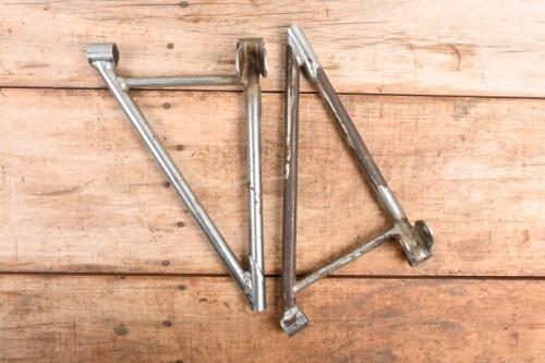 LOTUS: Two racing car wishbones believed to be Lotus 23