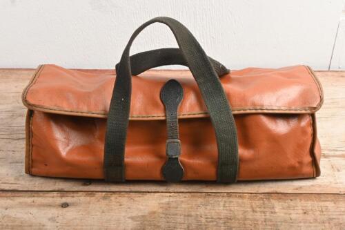 TOOL BAG: A tan tool kit in hessian and vinyl