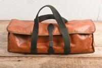 TOOL BAG: A tan tool kit in hessian and vinyl