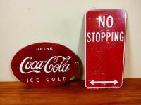 SIGNS: A 'Coke' oval enamel sign together with a &lsquo;NO STOPPING&rsquo; tin sign