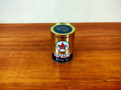 CALTEX: A sealed gold can of 'Caltex Supreme Multigrade 10W-30'