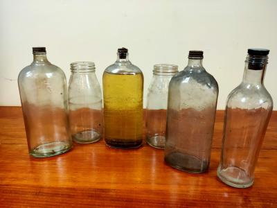 LAUREL KEROSENE: collection of 6 glass bottles