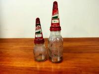CASTROL: Two glass oil bottles with tin 'XL Medium Super Grade' pourers, one embossed 'Castrol Wakefield'