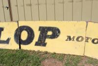 DUNLOP: A large &lsquo;DUNLOP MOTORSPORT&rsquo; tin sign ex- Surfers Paradise International Raceway (740cm wide). - 6