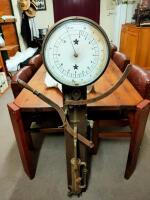 SCALE: An early wall mounted 3 LBS. weighing scales