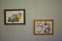 PHIL READ: Two prints featuring Phil Read racing his MV Agusta motorcycle, both signed by Read.
