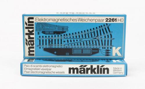 MARKLIN: Four M&auml;rklin 2261 electrical normal soft left 2262 K track sections, two per box, both boxed