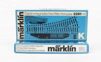 MARKLIN: Four M&auml;rklin 2261 electrical normal soft left 2262 K track sections, two per box, both boxed