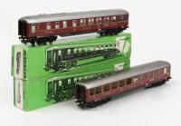 MARKLIN: Two boxed Marklin 4024 express restaurant cars in red German Federal Railways livery