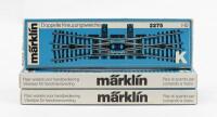 MARKLIN: Three boxed Marklin K track sections including two 2271 right turnouts and 2275 double slip switch