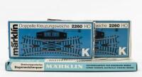 MARKLIN: Three boxed Marklin K track sections including two 2260 double slip switch and one curved turnout
