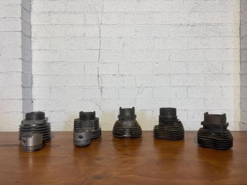 VELOCETTE: A collection of five barrrels, two with pistons [Location: Sydney]