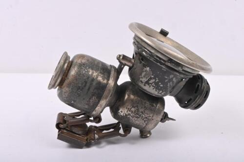 BIKE LAMP: A Powell & Hanmer, Birmingham, England, carbide bike lamp with lense