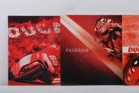 DUCATI: A collection of 2000s Ducati model year brochures including 2003, 2005, 2010 and others. - 2