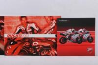 DUCATI: A collection of 2000s Ducati model year brochures including 2003, 2005, 2010 and others. - 3