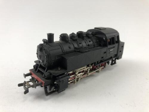 MARKLIN: A Marklin 0-8-0 tank locomotive with telex couplers, black steel body