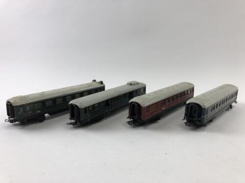 MARKLIN: Four Marklin items (three express coaches, one luggage van), circa 1955