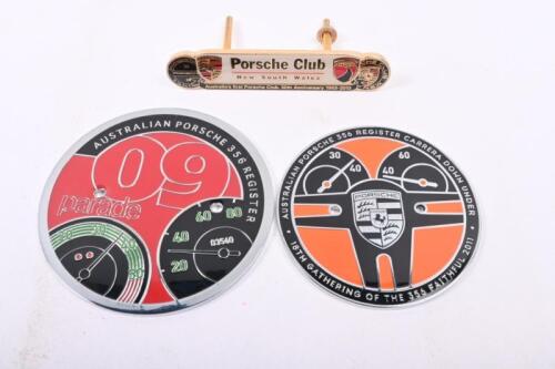 PORSCHE: A collection of three Porsche grill badges including Porsche Club NSW, and two round Porsche 356 Register badges.