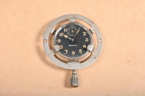 MONARCH: A interesting Monarch dash mount clock with surround for mounting