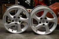 PORSCHE: A set of factory original 996&nbsp;Porsche 'Turbo Twist' wheel rims, with centre caps, spacers and nuts, rear 18 x 11- 45 O/S, front 18 x 8 - 50 O/S, also believed to be suitable for 993 models. These wheels were removed from a wide body Porsche 964.&nbsp; - 2