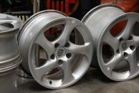 PORSCHE: A set of factory original 996&nbsp;Porsche 'Turbo Twist' wheel rims, with centre caps, spacers and nuts, rear 18 x 11- 45 O/S, front 18 x 8 - 50 O/S, also believed to be suitable for 993 models. These wheels were removed from a wide body Porsche 964.&nbsp; - 3