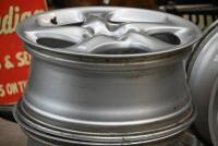 PORSCHE: A set of factory original 996&nbsp;Porsche 'Turbo Twist' wheel rims, with centre caps, spacers and nuts, rear 18 x 11- 45 O/S, front 18 x 8 - 50 O/S, also believed to be suitable for 993 models. These wheels were removed from a wide body Porsche 964.&nbsp; - 4