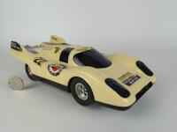PORSCHE: A large 1970s battery operated 917 Porsche in Martini Racing Team livery, 33cm long.