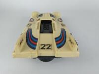 PORSCHE: A large 1970s battery operated 917 Porsche in Martini Racing Team livery, 33cm long. - 4