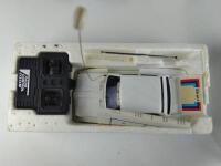 PORSCHE/BMW: Three Porsche and BMW remote control cars, two with original boxes and all with hand controler.&nbsp; - 6
