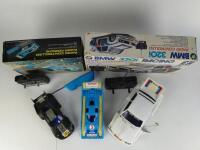 PORSCHE/BMW: Three Porsche and BMW remote control cars, two with original boxes and all with hand controler.&nbsp; - 8