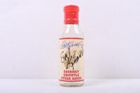 EVEL KNIEVEL: An empty 'Evel Knievel GOURMET CHIPOTLE STEAK SAUCE' bottle with front label hand signed by Evel Knievel
