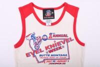 EVEL KNIEVEL: An EVEL KNIEVEL 'Officially Licensed Apparel' singlet promoting 2002 1st Annual 'EVEL KNIEVEL WEEK - BUTTE MONTANA'; Children's size L. Approx 50cm high, 33cm wide. - 2