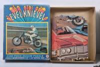 EVEL KNIEVEL: Two 1974&nbsp;HG TOYS 'EVEL KNIEVEL' puzzle sets - 'AUTO HURDLE' (No. 475-03) & 'CANYON JUMP' (No.475-01) - 3