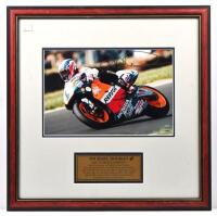 MICK DOOHAN: A numbered autographed photo by AUTOGRAPHED COLLECTIBLES&nbsp;of Mick Doohan in a state of race riding a 500cc Honda NSR 500. Photograph numbered '1396'