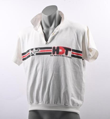 HDT: A Peter Brock HDT 'We Build Excitement' ladies polo shirt. Believed to be size 16 Large or XL.